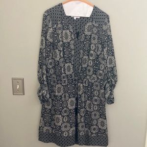 1 piece dress Size L Fun details like button sleeve accents cinched waist tie.